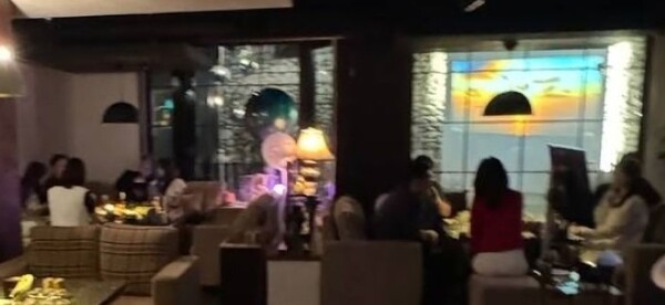 더불어민주당이 19일 공개한 지귀연 서울중앙지법 부장판사의 '룸살롱 술접대 의혹' 사진. / 사진=민주당